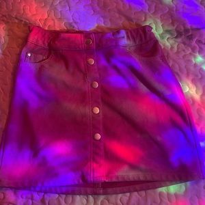 Cute pink mini skirt that buttons